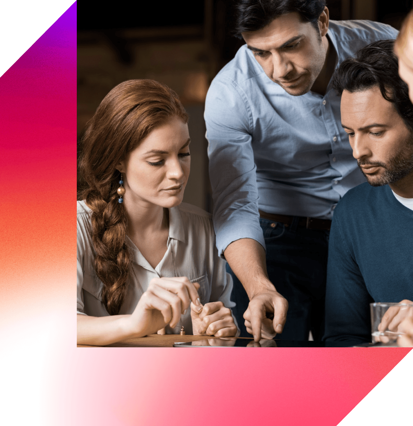 image of people looking at a document