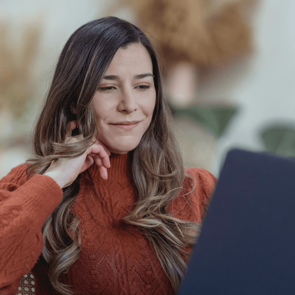 woman looking at computer