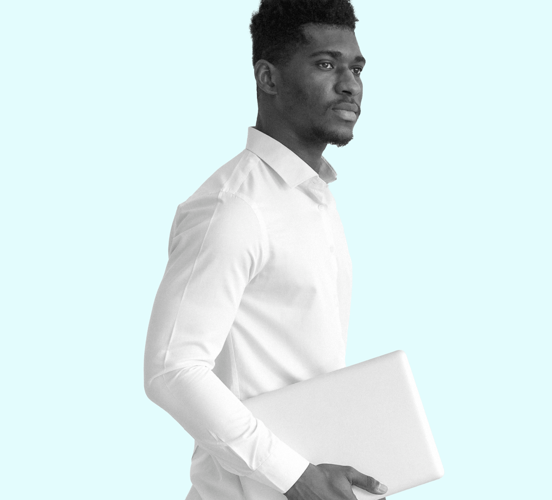 black man holding laptop